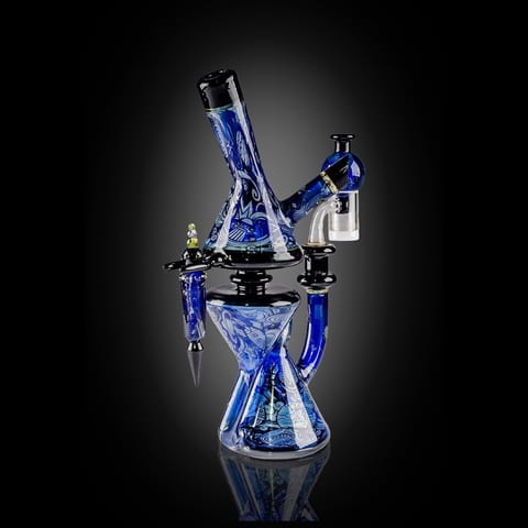 The blue-and-white patterned glass recycler by Robert Mickelsen seen from the other side