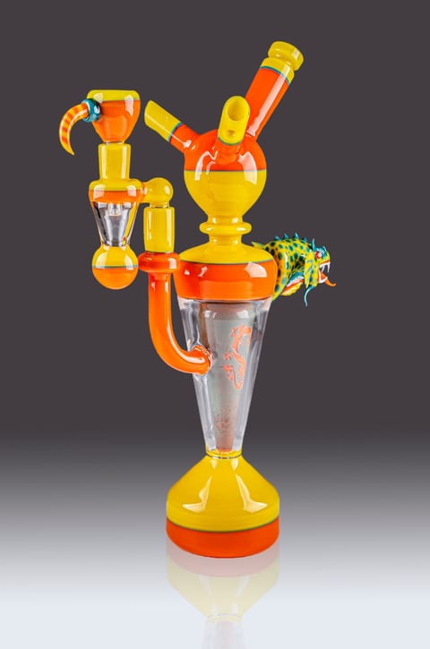 The orange and yellow glass rig by Robert Mickelsen from another angle, showing the lizard and the curled horn