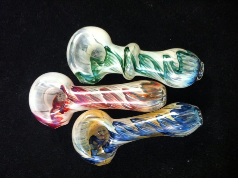 Three hand pipes with cream, green and blue swirl work