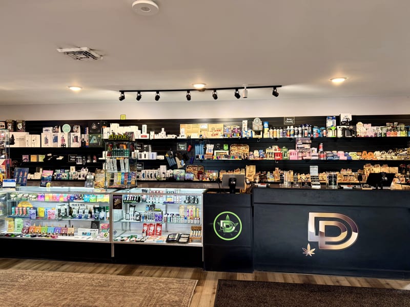 The sales floor at Dryden Dispensary, looking down the room toward the counter
